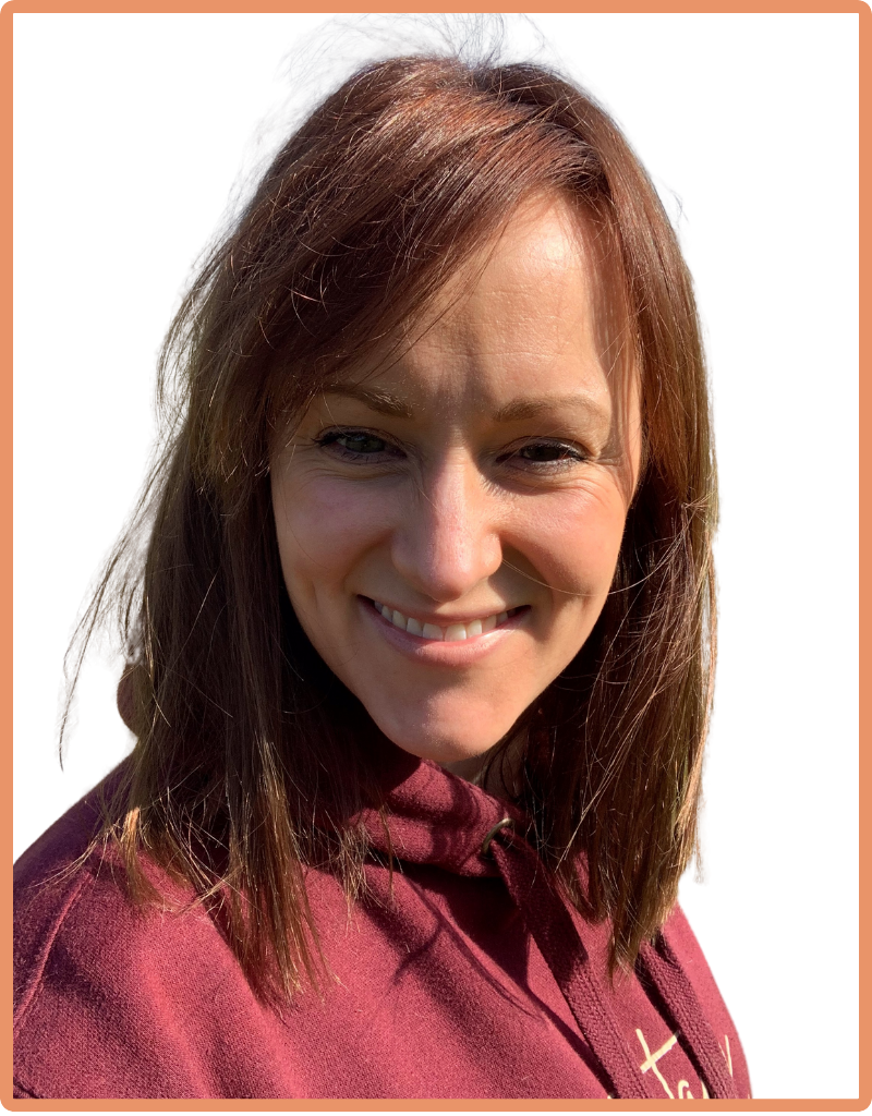 A photograph of Carla from Teaching In Good Company. Carla is a Caucasian woman with medium length brown hair and she is smiling at the camera